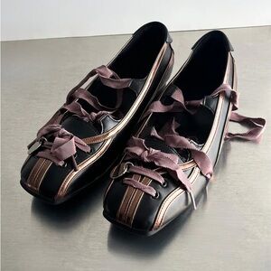 Flat soles made from brown PU leather, complete with brown lace-up ribbons.